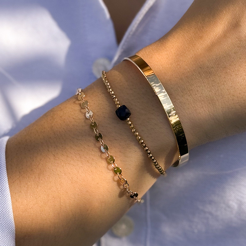 Bracelet fin doré et Onyx Noir