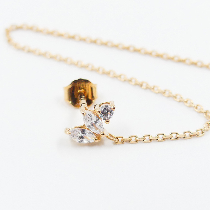 Boucle à l'unité dorée double lotus strass