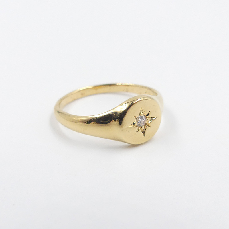 Bague dorée chevalière étoile