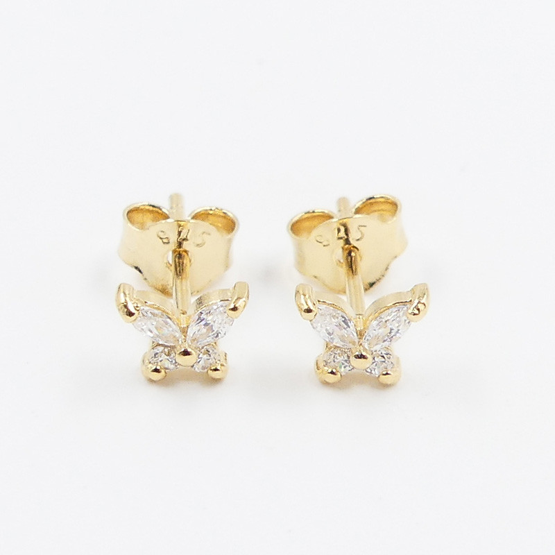 Clous d'oreilles plaqué or papillon strass