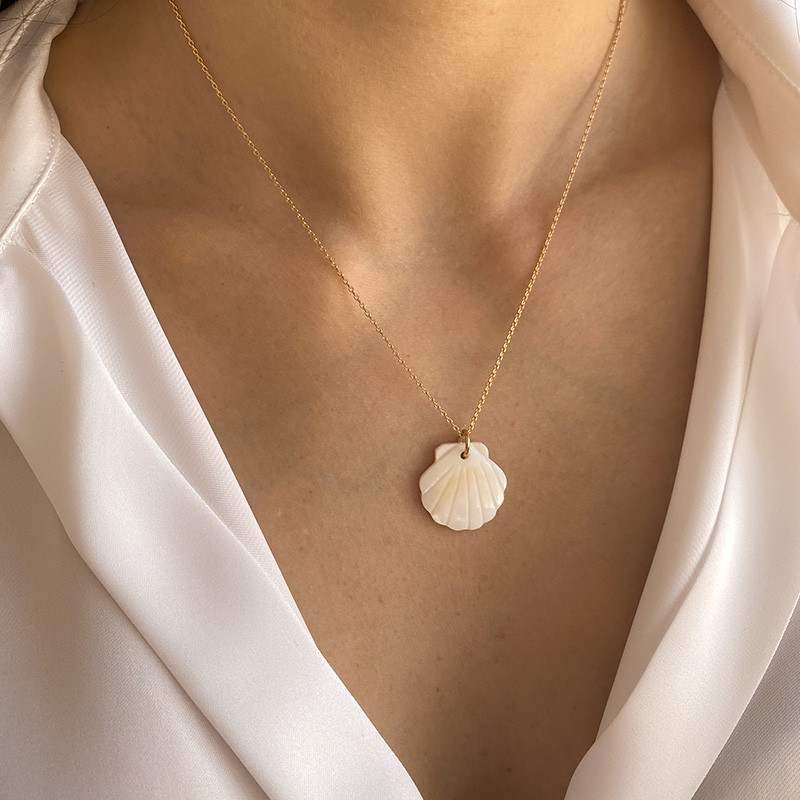 Charm's plaqué or coquillage nacre