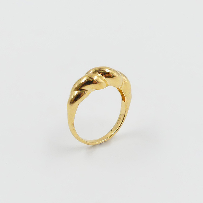 Bague dorée torsadée