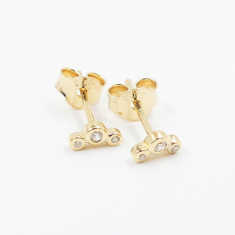 Clous d'oreilles Dorés trio strass