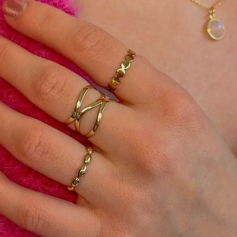 Bague dorée entrelacs