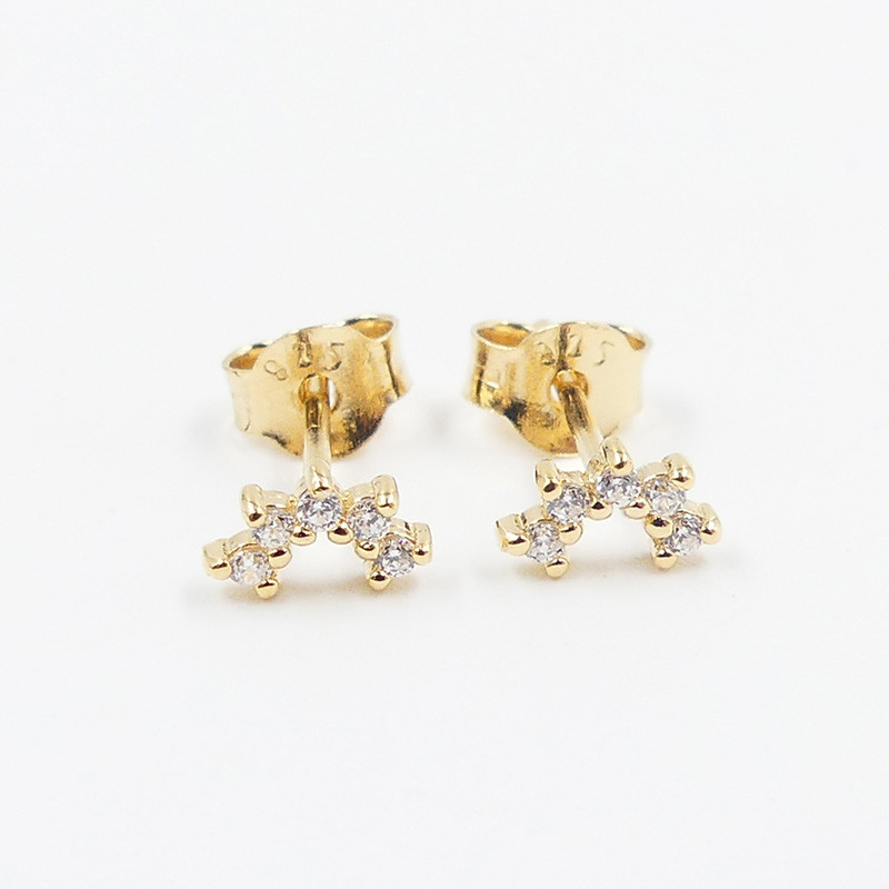 Clous d'oreilles Dorés mini arc strass