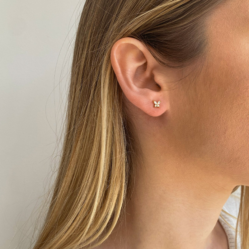 Clous d'oreilles plaqué or papillon strass