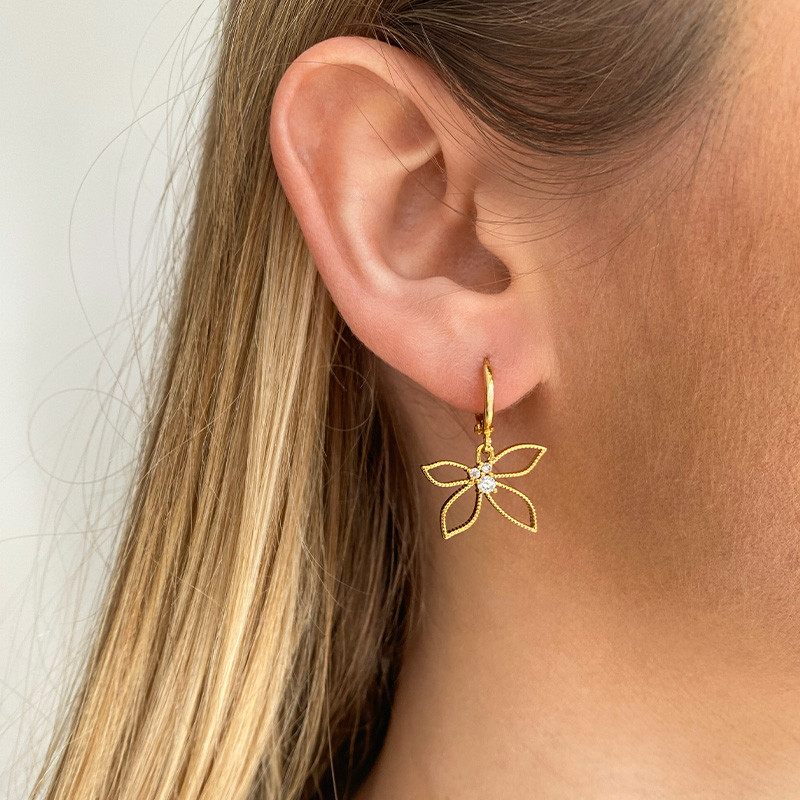 Boucle à l'unité doré demi fleur strass