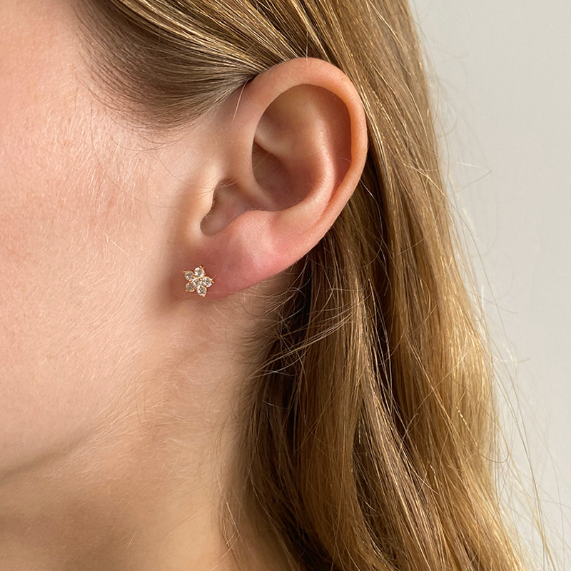 Piercing doré fleur strass