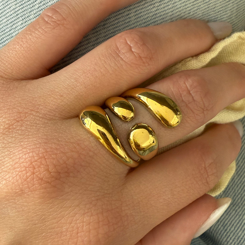 Bague large acier doré entrelacée