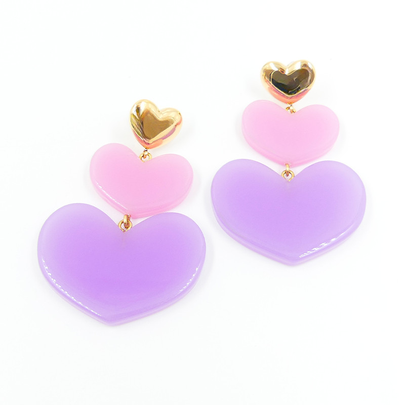 Boucles d’oreilles acier doré coeurs pendants