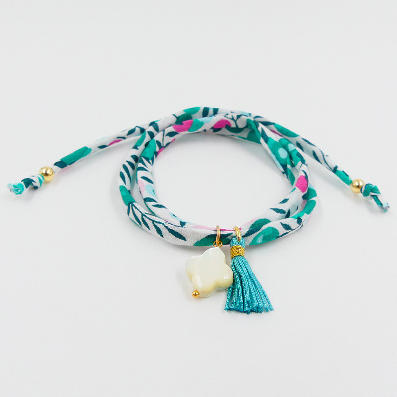 Bracelet Cordon Liberty Doré Trèfle et pompon turquoise
