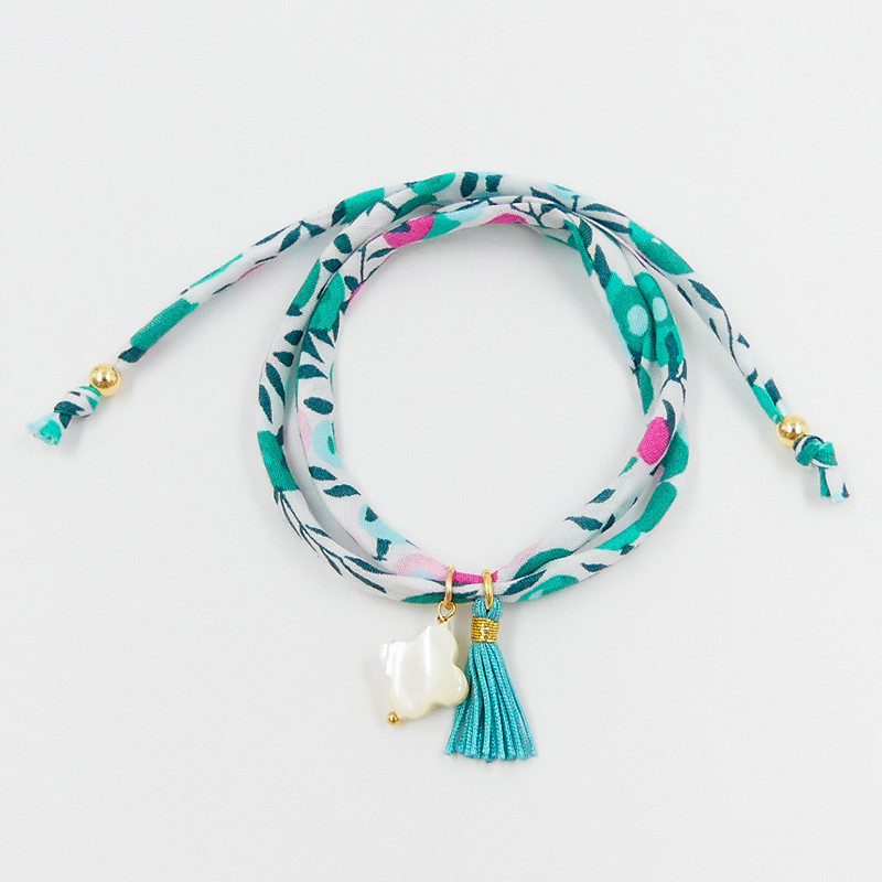 Bracelet Cordon Liberty Doré Trèfle et pompon turquoise