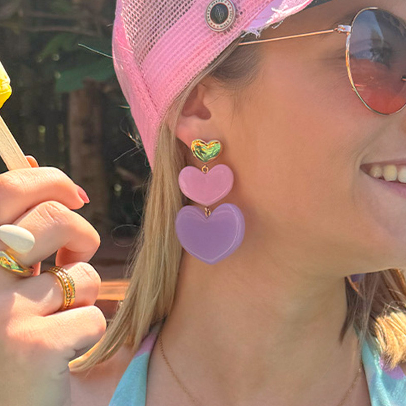 Boucles d’oreilles acier doré coeurs pendants