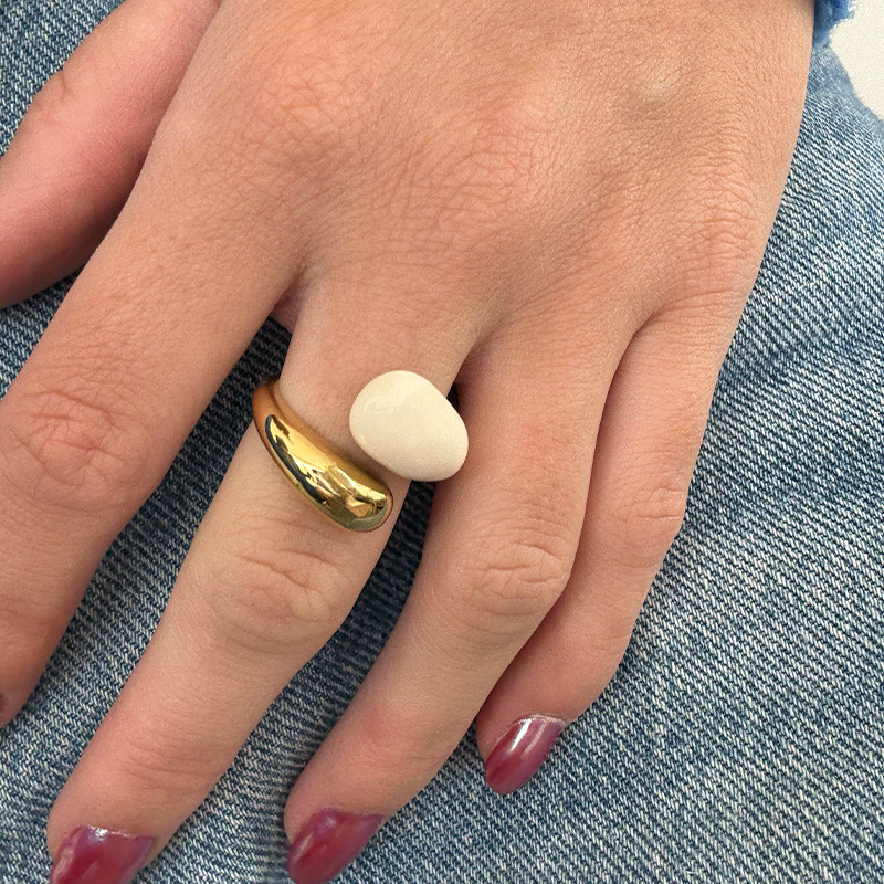 Bague acier doré enlacée ajustable bicolore