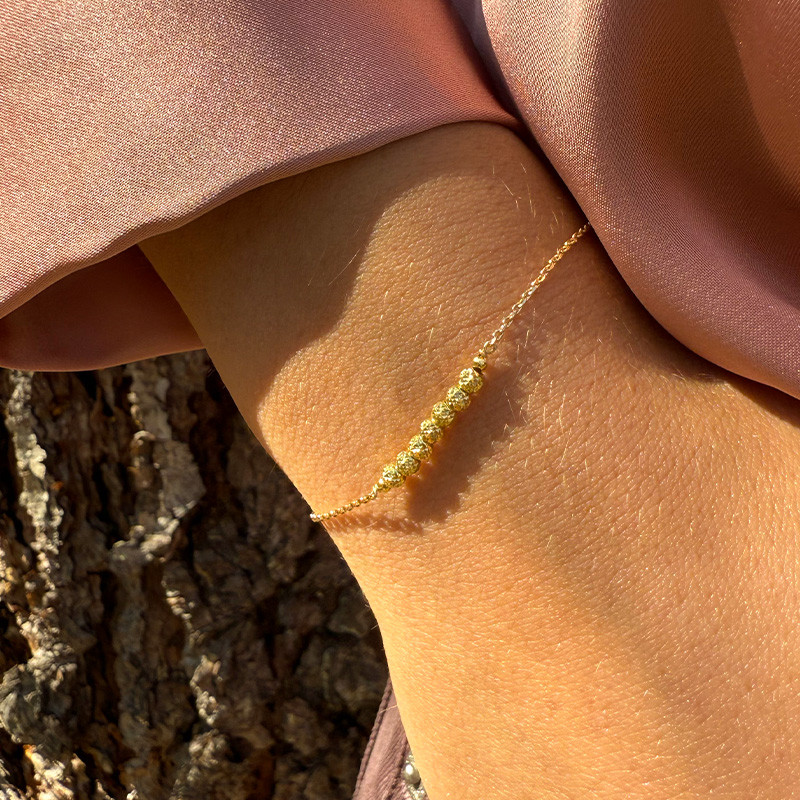 Bracelet Doré barrette perles striées