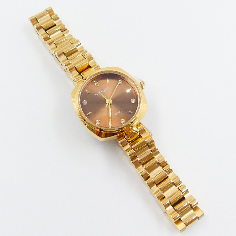 Montre doré cadran chocolat