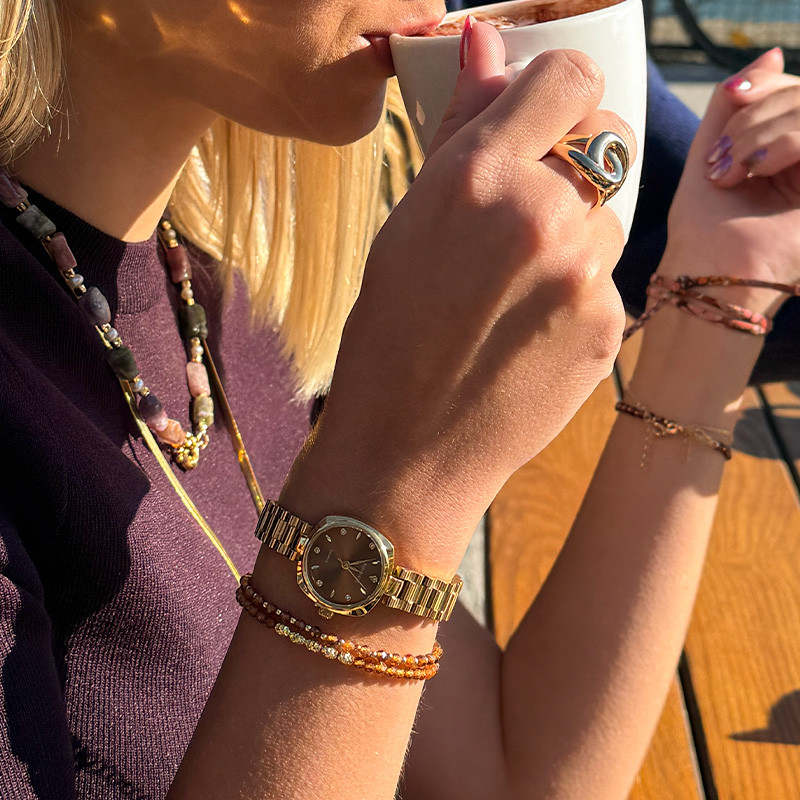 Montre doré cadran marron