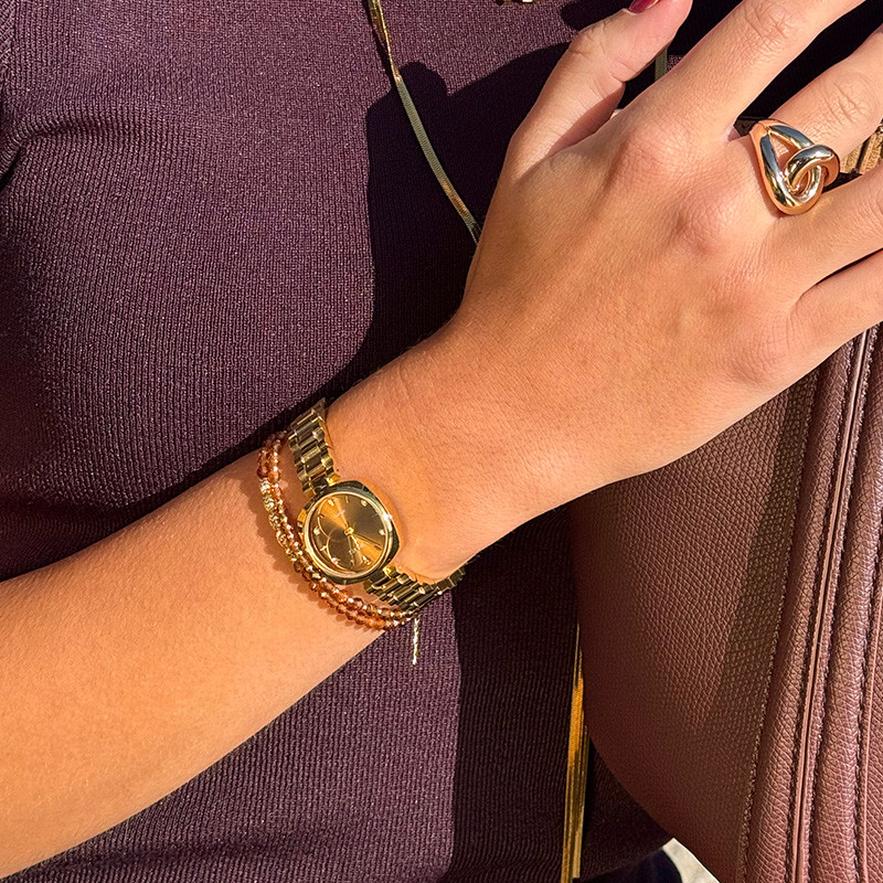 Montre doré cadran chocolat