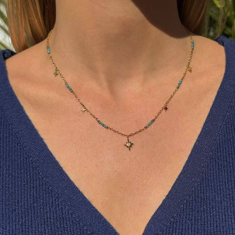 Collier acier doré et bleu étoile du nord