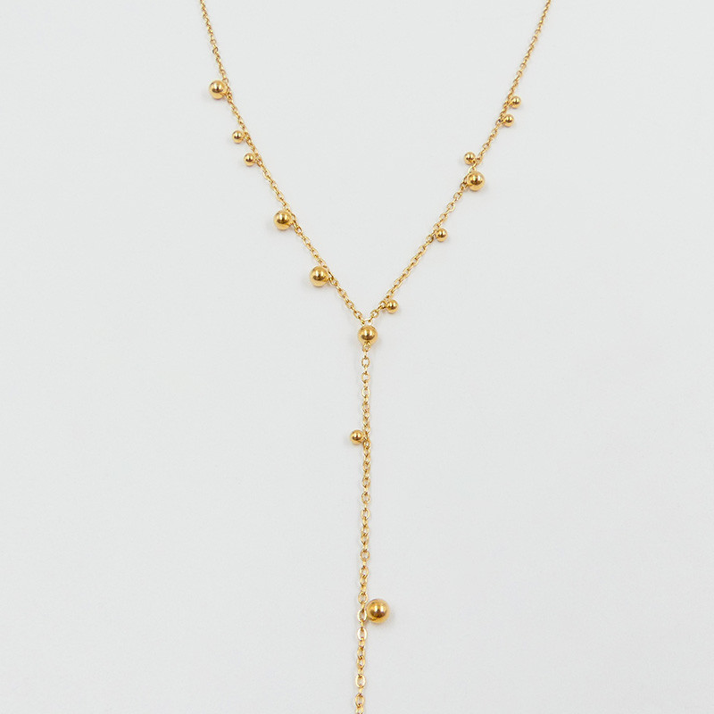 Collier cravate acier doré boule