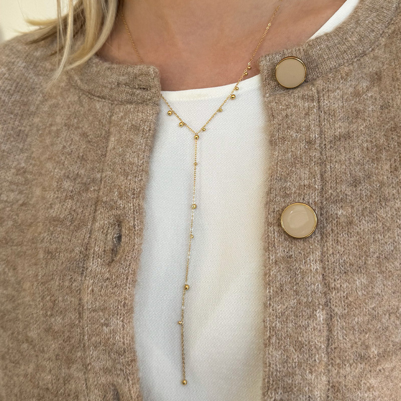 Collier cravate acier doré boule