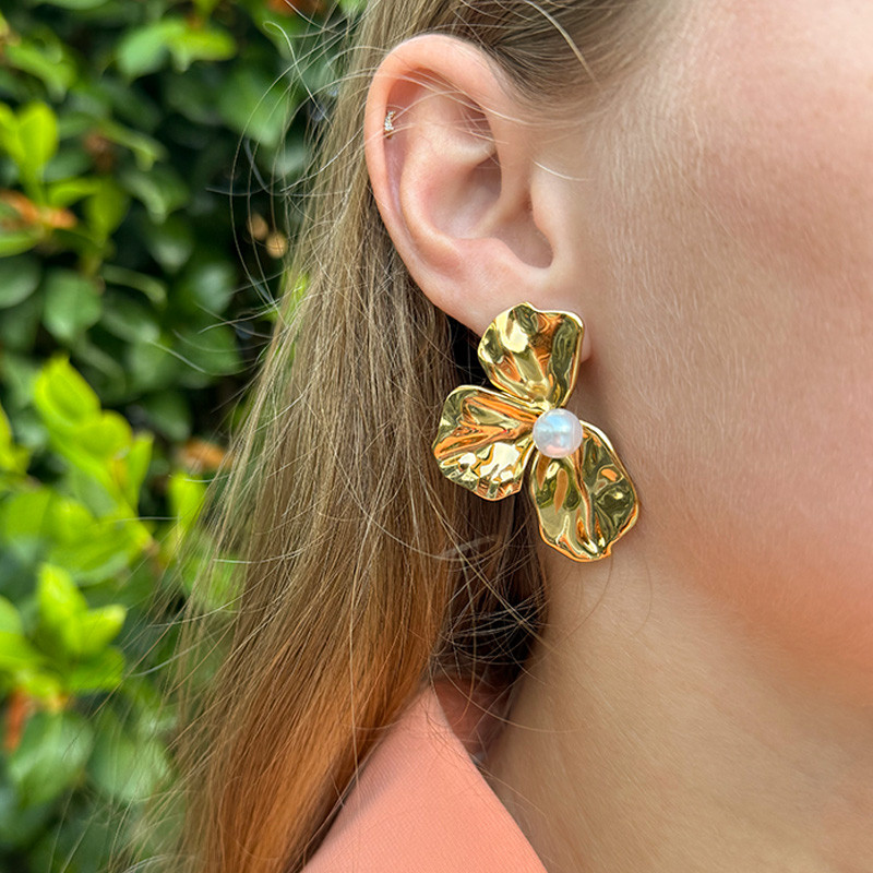 Boucles d’oreilles acier demi fleur et perle