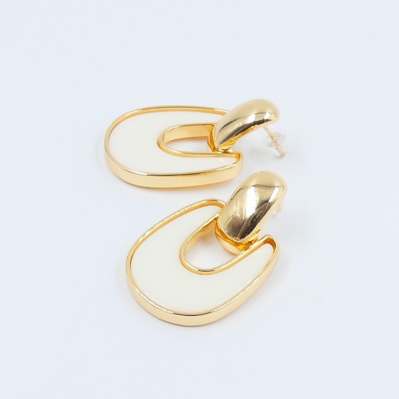 Boucles d’oreilles géométrique résine ivoire