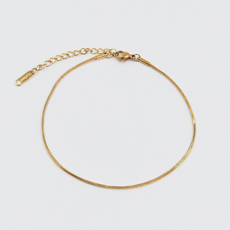 Chaîne de cheville acier doré maille serpentine