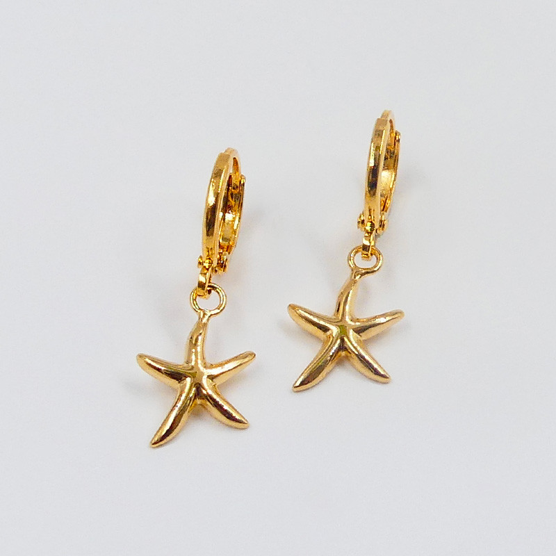 Boucle d'oreille étoile de mer dorée