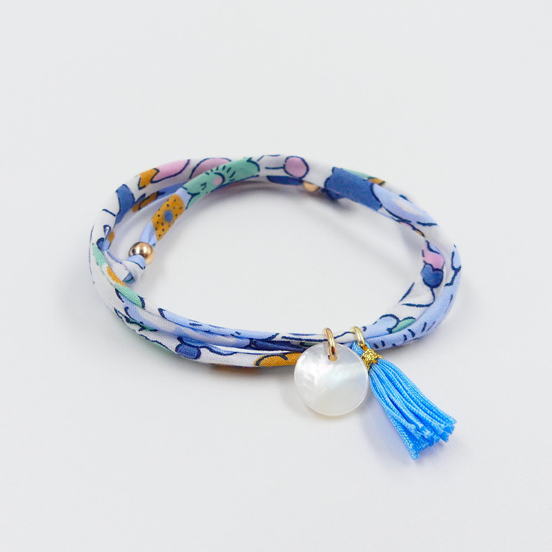 Bracelet pompon bleu enfant