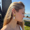 Boucles d’oreilles coquillage acier doré pendantes