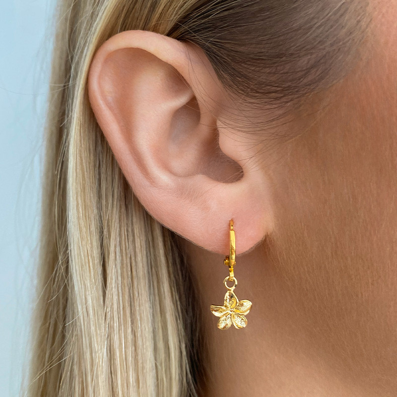 Boucle à l'unité dorée fleur tropicale