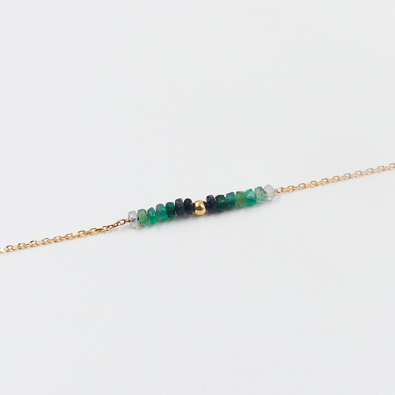 bracelet en or jaune et émeraude