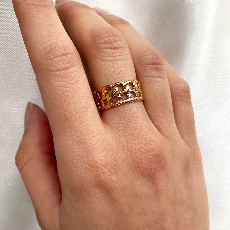 Bague ajustable acier doré large à motifs