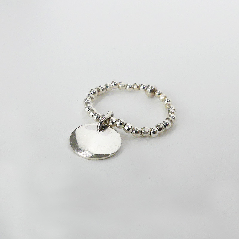 Bague Argent élastique et médaille